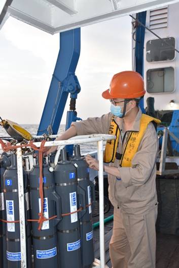 A picture containing truck, man, sitting, carDescription automatically generated